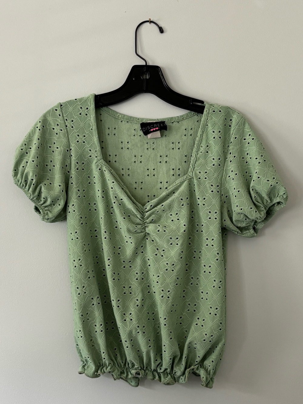 Discreet Green cinched bust top.